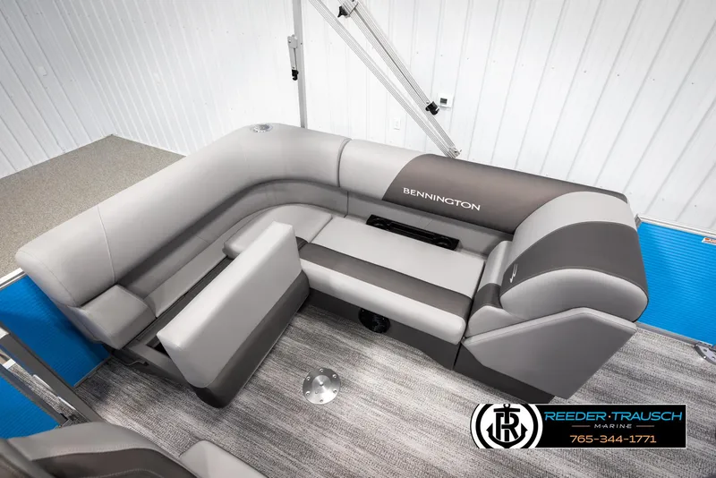 Slide: The Image of 2025 Bennington 16 SFSE boat interior with gray seating and carpet flooring. - 20
