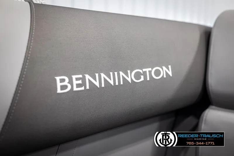 Slide: The Image of 2025 Bennington 16 SFSE boat seat with logo, featuring sleek gray upholstery. - 33