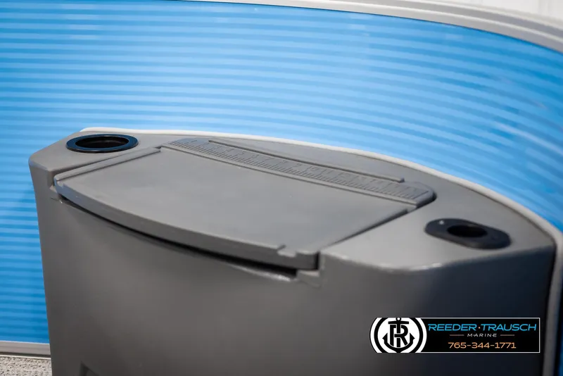 Slide: The Image of 2025 Bennington 16 SFSE boat console with cup holders and storage compartment. - 37