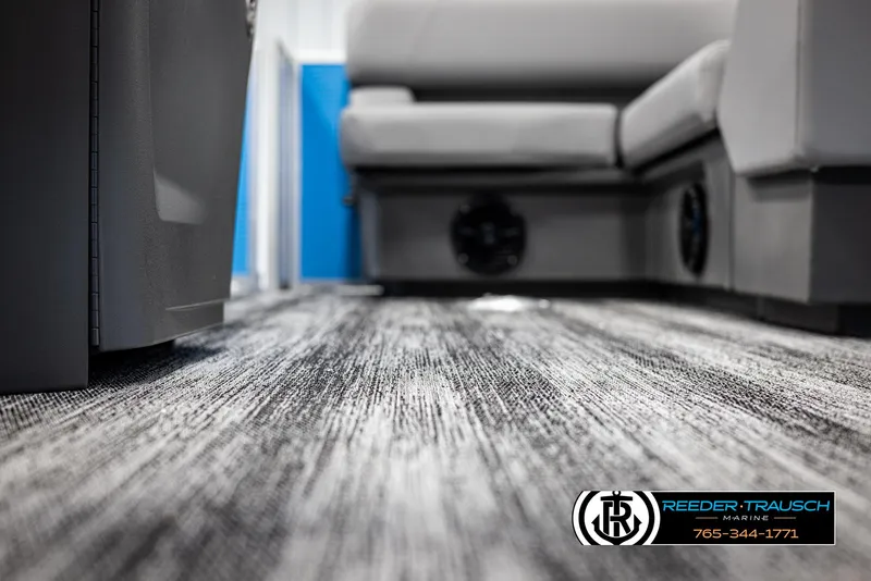 Slide: The Image of 2025 Bennington 16 SFSE interior with modern flooring and seating. - 39