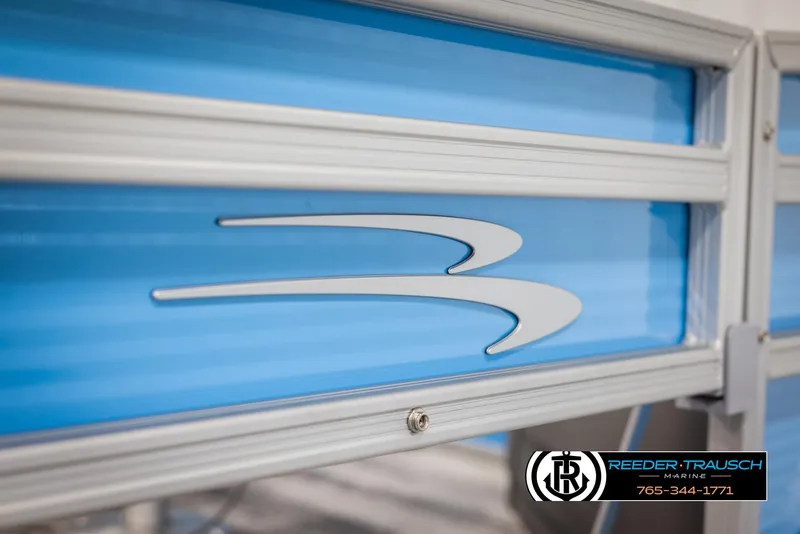 Slide: The Image of 2025 Bennington 16 SFSE boat detail with logo and Reeder-Trausch Marine branding. - 41