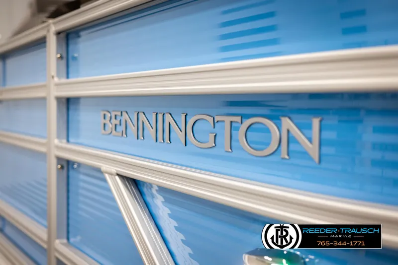 Slide: The Image of 2025 Bennington 16 SFSE boat with blue paneling and logo detail. - 43