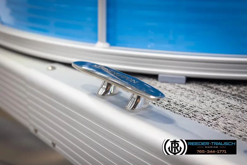 Slide: The Image of Close-up of 2025 Bennington 16 SFSE boat cleat, featuring sleek design and branding. - 45