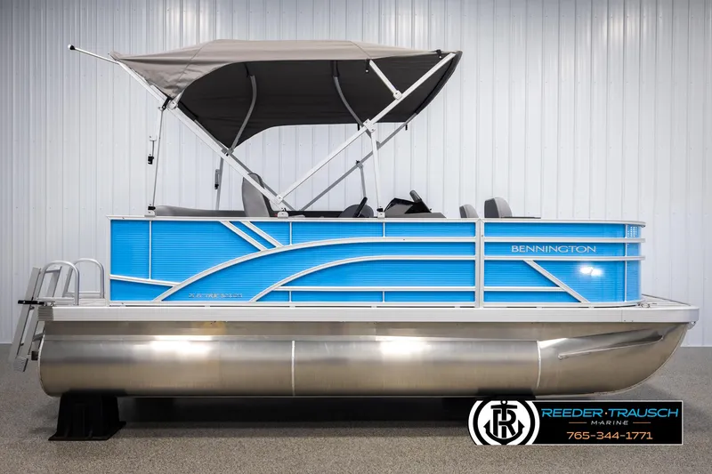 Slide: The Image of 2025 Bennington 16 SFSE pontoon boat with blue panels and canopy. - 5