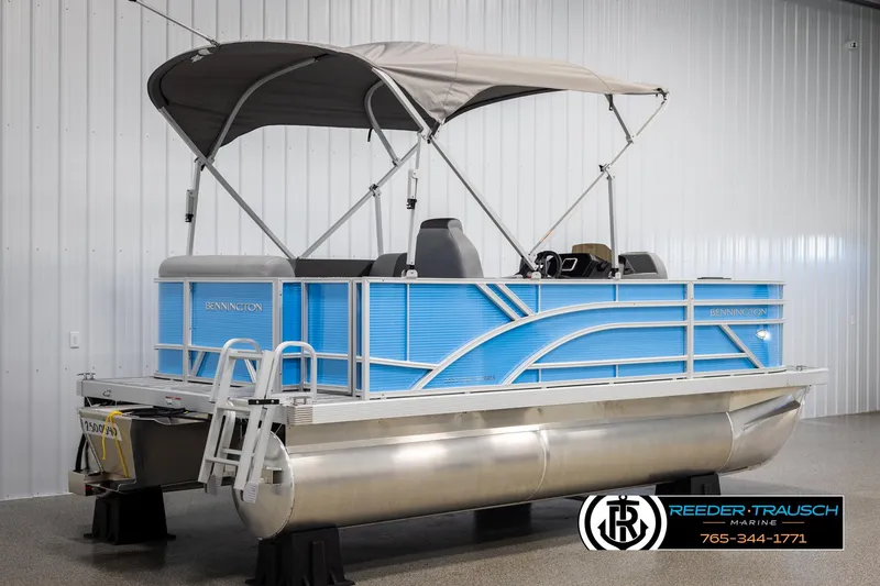 Slide: The Image of 2025 Bennington 16 SFSE pontoon boat with canopy in showroom. - 6