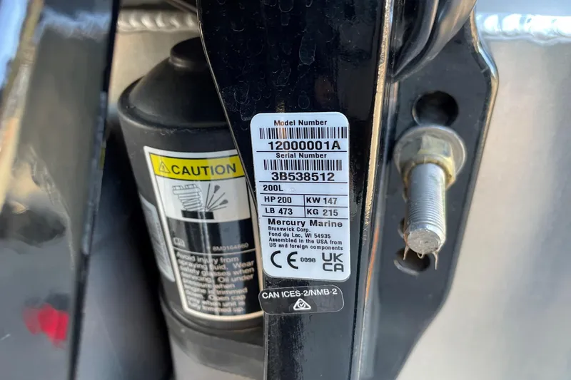 Slide: The Image of Label on 2025 Sun Tracker Fishin' Barge 22 XP3, showing model and serial numbers. - 81