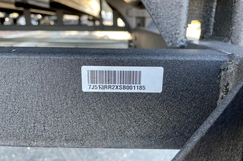 Slide: The Image of Barcode and serial number on 2025 Sun Tracker Fishin' Barge 22 XP3 frame. - 82