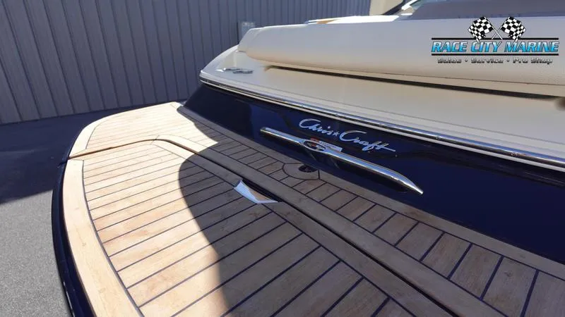 Slide: The Image of 2025 Chris-Craft Sportster boat with wooden deck at Race City Marine. - 11