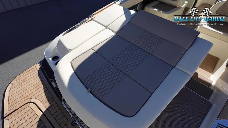 Slide: The Image of 2025 Chris-Craft Sportster boat with spacious sun deck and elegant seating. - 12
