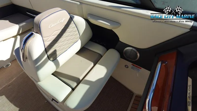 Slide: The Image of 2025 Chris-Craft Sportster interior with luxurious seating and modern design. - 21