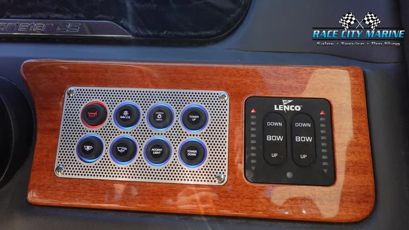 Slide: The Image of Control panel of 2025 Chris-Craft Sportster boat with Lenco trim tab switches. - 30