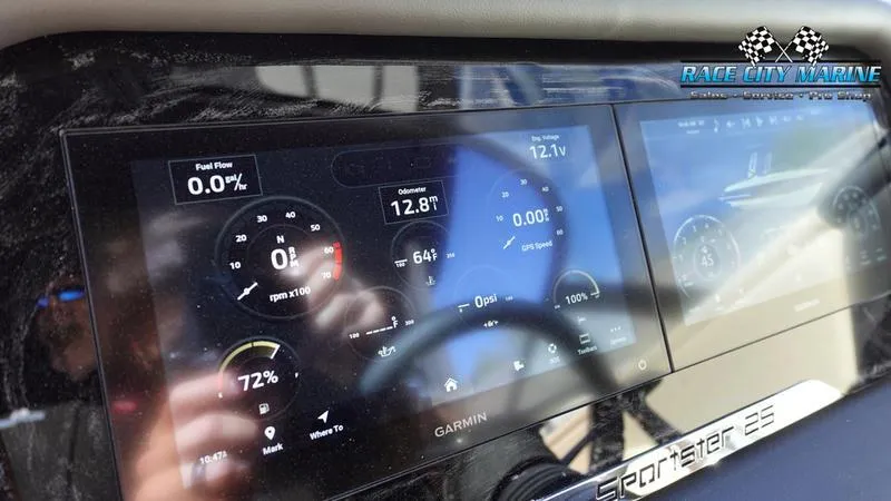 Slide: The Image of 2025 Chris-Craft Sportster dashboard with Garmin display showing fuel flow and engine metrics. - 32