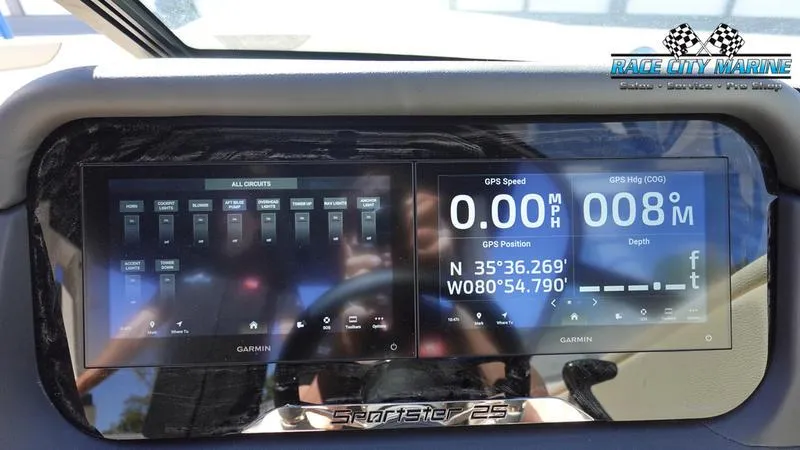 Slide: The Image of Dashboard of 2025 Chris-Craft Sportster boat with GPS and marine controls. - 33