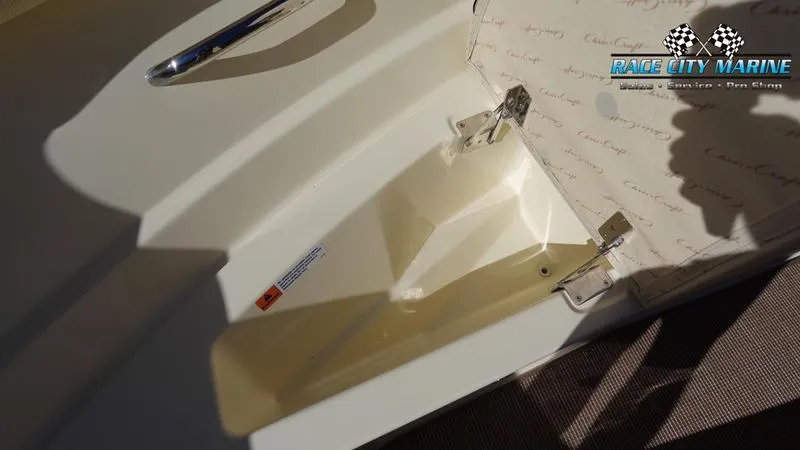 Slide: The Image of 2025 Chris-Craft Sportster boat interior detail with storage compartment. - 42
