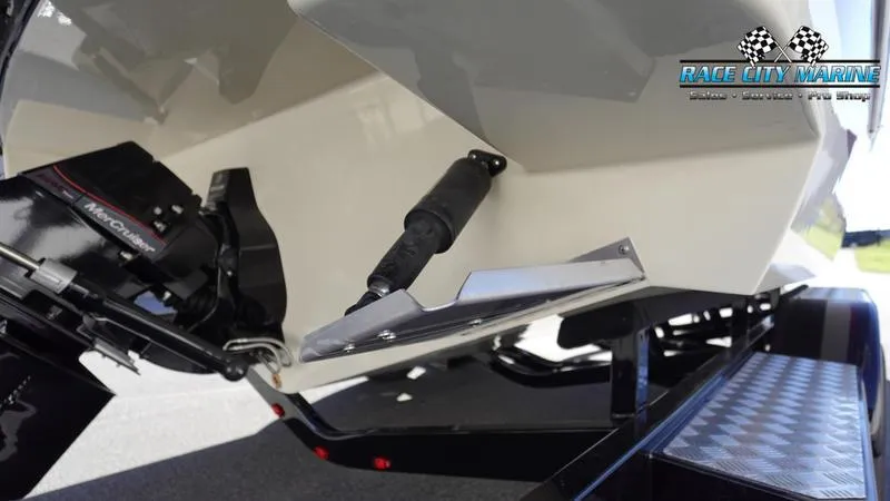 Slide: The Image of 2025 Chris-Craft Sportster boat on trailer, showcasing rear hull and motor details. - 9