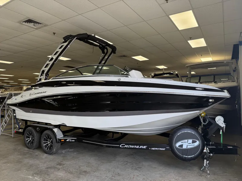 The Image of 2025 Crownline Eclipse E235 boat on trailer at Hern Marine dealership. - 0