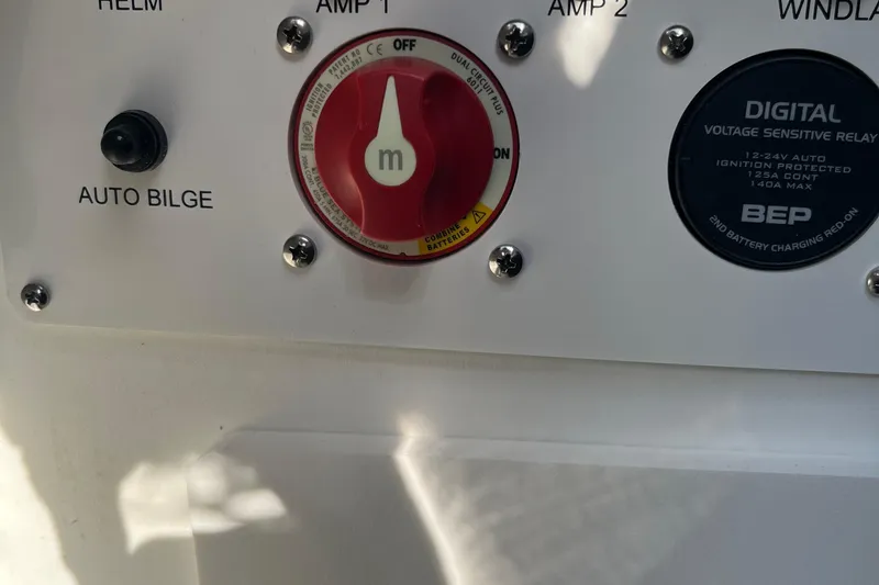 Slide: The Image of Control panel of 2025 Crownline Eclipse E235 boat with auto bilge and voltage relay. - 20