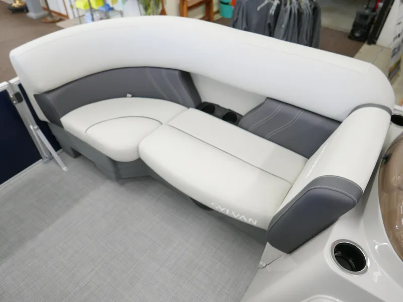 Slide: The Image of 2025 Sylvan Mirage 8520 LZ boat interior with plush seating and modern design. - 4