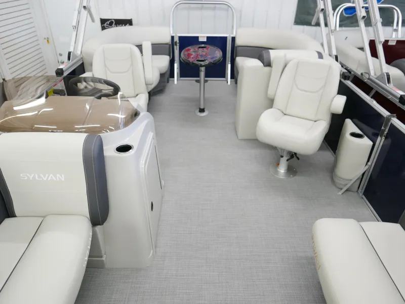 Slide: The Image of 2025 Sylvan Mirage 8520 LZ pontoon boat interior with plush seating and modern design. - 6