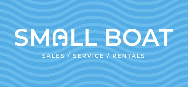 Slide: The Image of Inflatable Caribe MVP11 boat displayed outside modern building with American flag, 2025 model. - 2