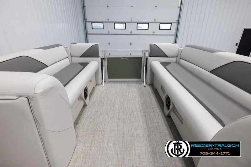 Slide: The Image of 2025 Avalon VENT CRB interior with gray and white seating in a garage setting. - 19