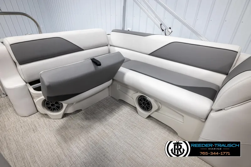 Slide: The Image of 2025 Avalon VENT CRB boat interior with gray seating and built-in speakers. - 25
