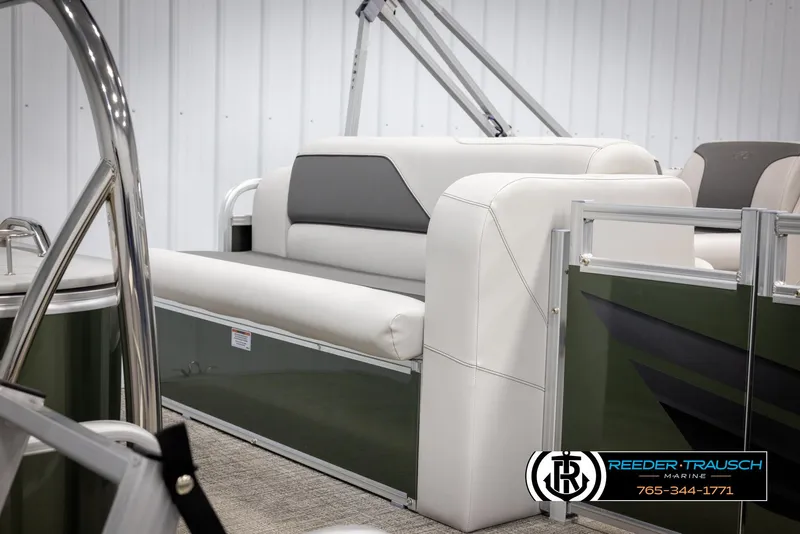 Slide: The Image of 2025 Avalon VENT CRB boat interior with white and gray seating, Reeder-Trausch Marine logo. - 26