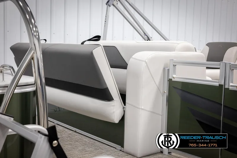Slide: The Image of 2025 Avalon VENT CRB boat interior with sleek white and gray seating. - 27