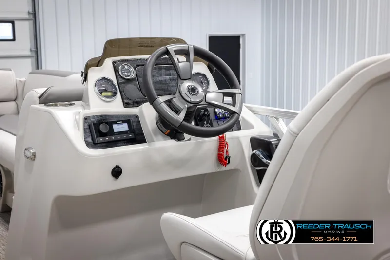 Slide: The Image of 2025 Avalon VENT CRB boat dashboard with steering wheel and controls. - 29