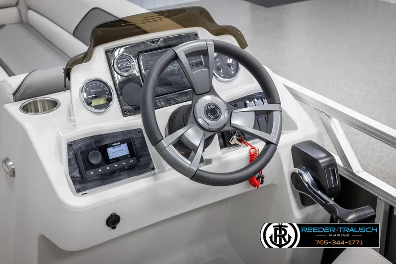 Slide: The Image of 2025 Avalon VENT CRB boat dashboard with steering wheel and controls. - 30