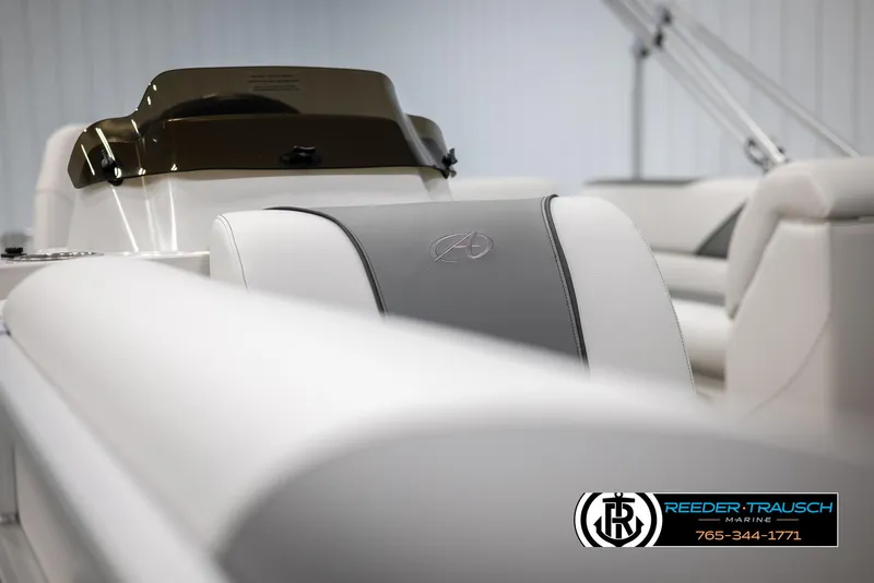 Slide: The Image of 2025 Avalon VENT CRB boat interior with sleek white seating and modern design. - 39