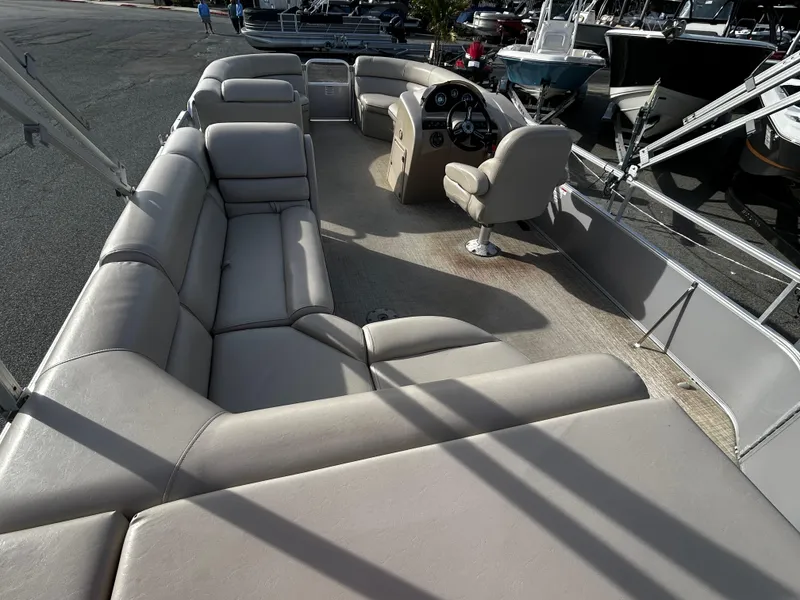 Slide: The Image of 2018 Berkshire 22CL CTS pontoon boat with spacious seating and helm. - 5