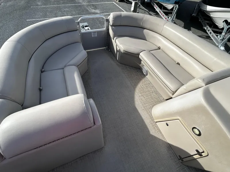 Slide: The Image of 2018 Berkshire 22CL CTS pontoon boat with spacious beige seating. - 9