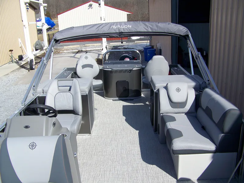 Slide: The Image of 2025 Avalon GeoFish23RF pontoon boat with spacious seating and modern design. - 10