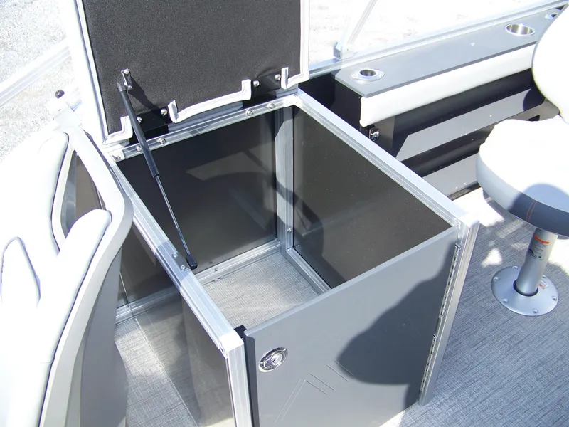 Slide: The Image of Open storage compartment in 2025 Avalon GeoFish23RF boat interior. - 13