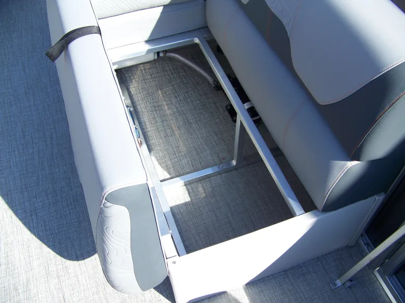 Slide: The Image of Avalon GeoFish23RF 2025 boat seat storage compartment with gray upholstery. - 15