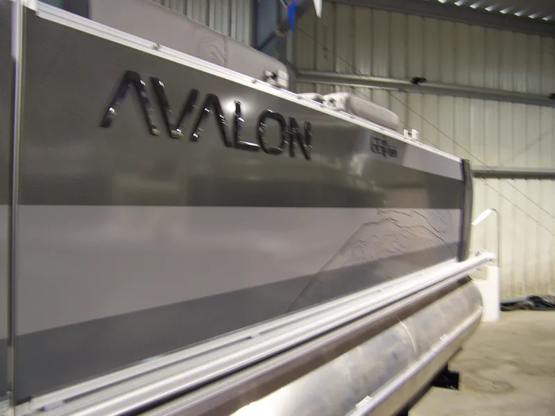 Slide: The Image of 2025 Avalon GeoFish23RF boat in a warehouse setting. - 3