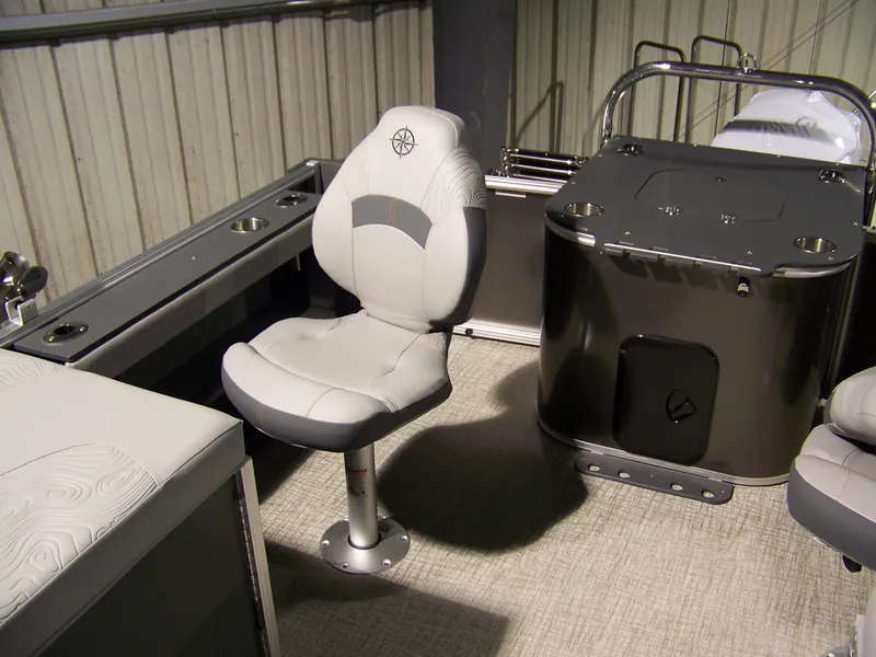 Slide: The Image of 2025 Avalon GeoFish23RF boat interior with swivel seat and console. - 4