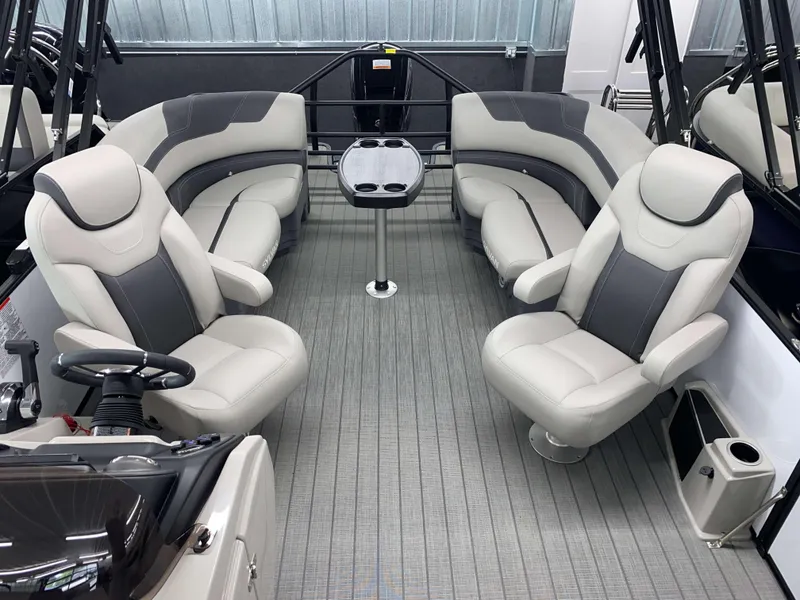 Slide: The Image of 2025 Sylvan L1 LZ boat interior with plush seating and modern design. - 11