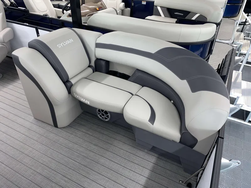 Slide: The Image of Luxurious seating on 2025 Sylvan L1 LZ boat, featuring elegant gray upholstery. - 13