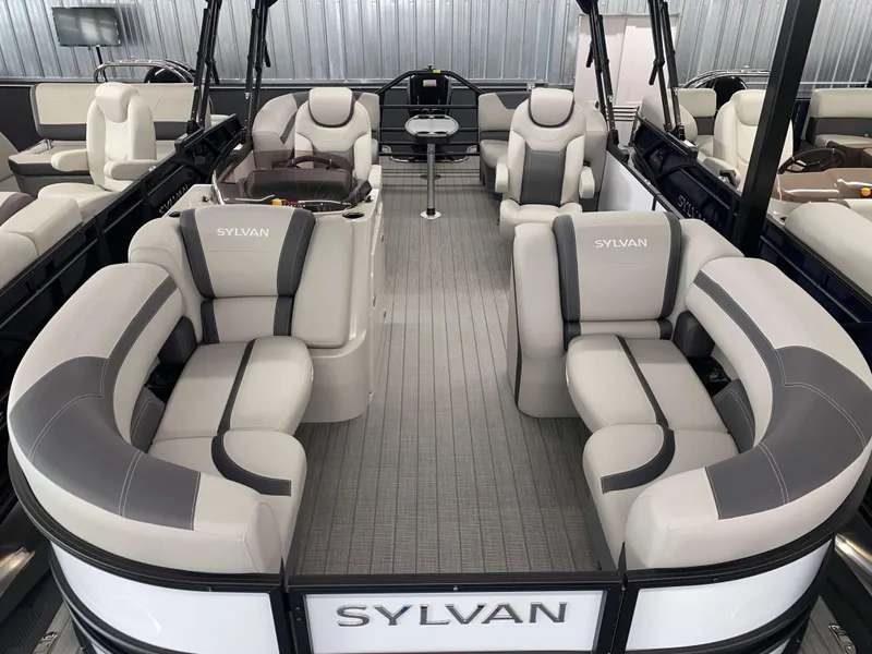 Slide: The Image of Luxurious 2025 Sylvan L1 LZ pontoon boat interior with plush seating and modern design. - 3