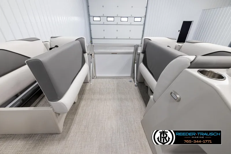 Slide: The Image of 2025 Avalon VENT CR interior with gray seating in a showroom. - 18