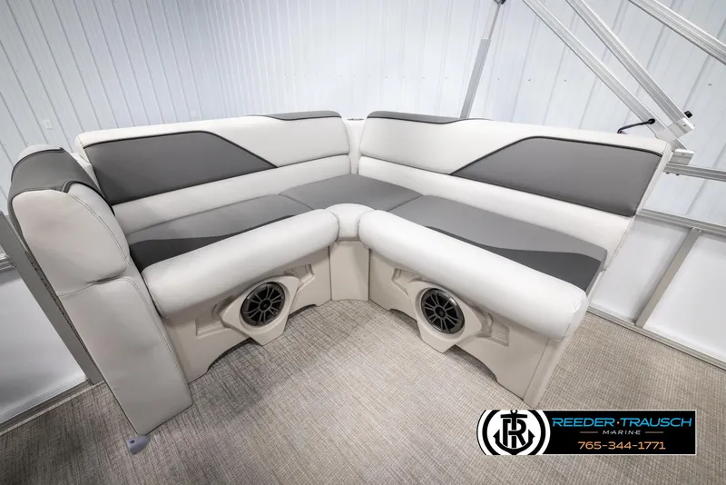 Slide: The Image of Avalon VENT CR 2025 boat seating with built-in speakers, gray and white upholstery. - 19
