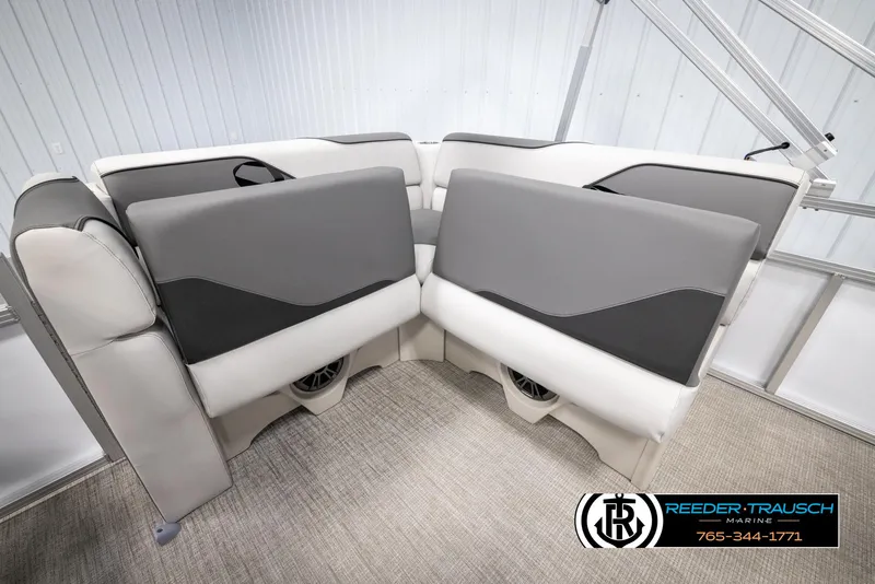 Slide: The Image of 2025 Avalon VENT CR boat seating with gray and white upholstery in showroom. - 20