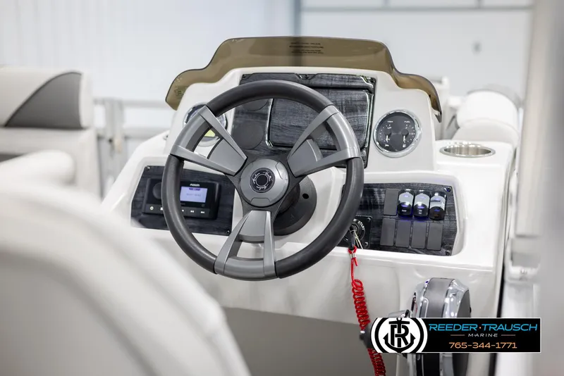 Slide: The Image of 2025 Avalon VENT CR boat steering console with modern controls and dashboard. - 21