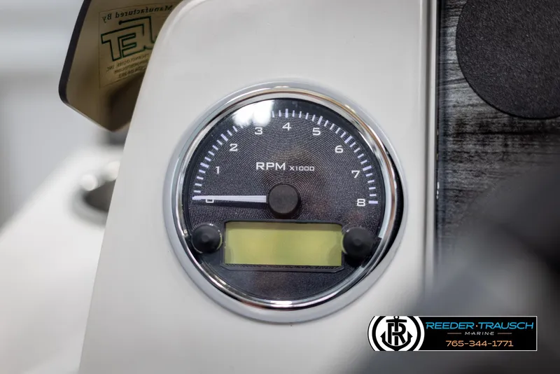 Slide: The Image of Close-up of 2025 Avalon VENT CR RPM gauge with Reeder-Trausch Marine logo. - 26