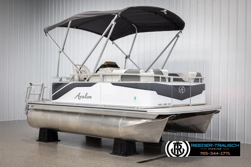 Slide: The Image of 2025 Avalon VENT CR pontoon boat with canopy in showroom. - 3