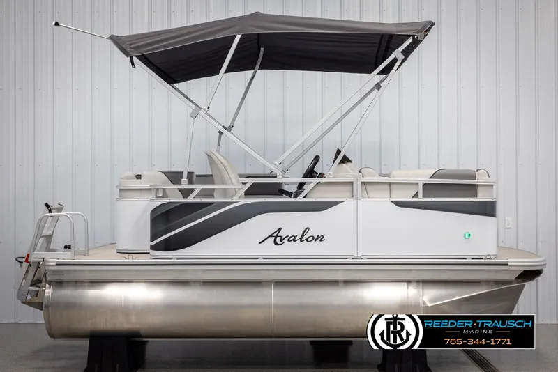 Slide: The Image of 2025 Avalon VENT CR pontoon boat with canopy in showroom. - 6
