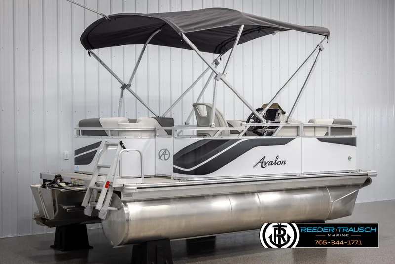 Slide: The Image of 2025 Avalon VENT CR pontoon boat with canopy in showroom. - 7