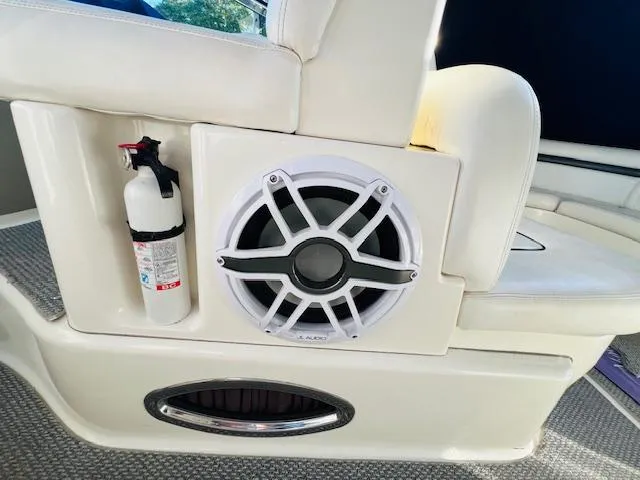 Slide: The Image of White speaker and fire extinguisher on 2004 Sea Ray 390 Sundancer boat interior. - 13